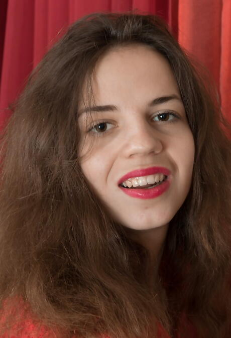 Stunning cutie Fiorella uncovering small tits and hairy pussy 